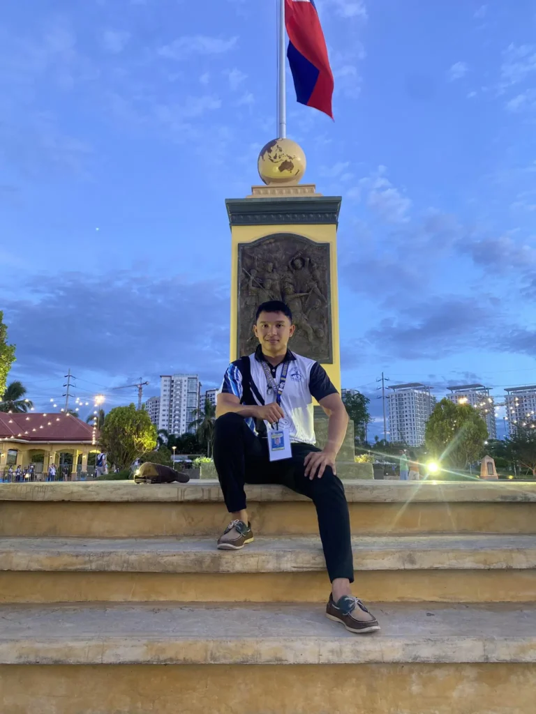 His Name is Jensen Dave Garingo, Sitting on the Steps of One of the Memorial Parks Located at the Mactan Shrine in Lapu-Lapu City, Cebu